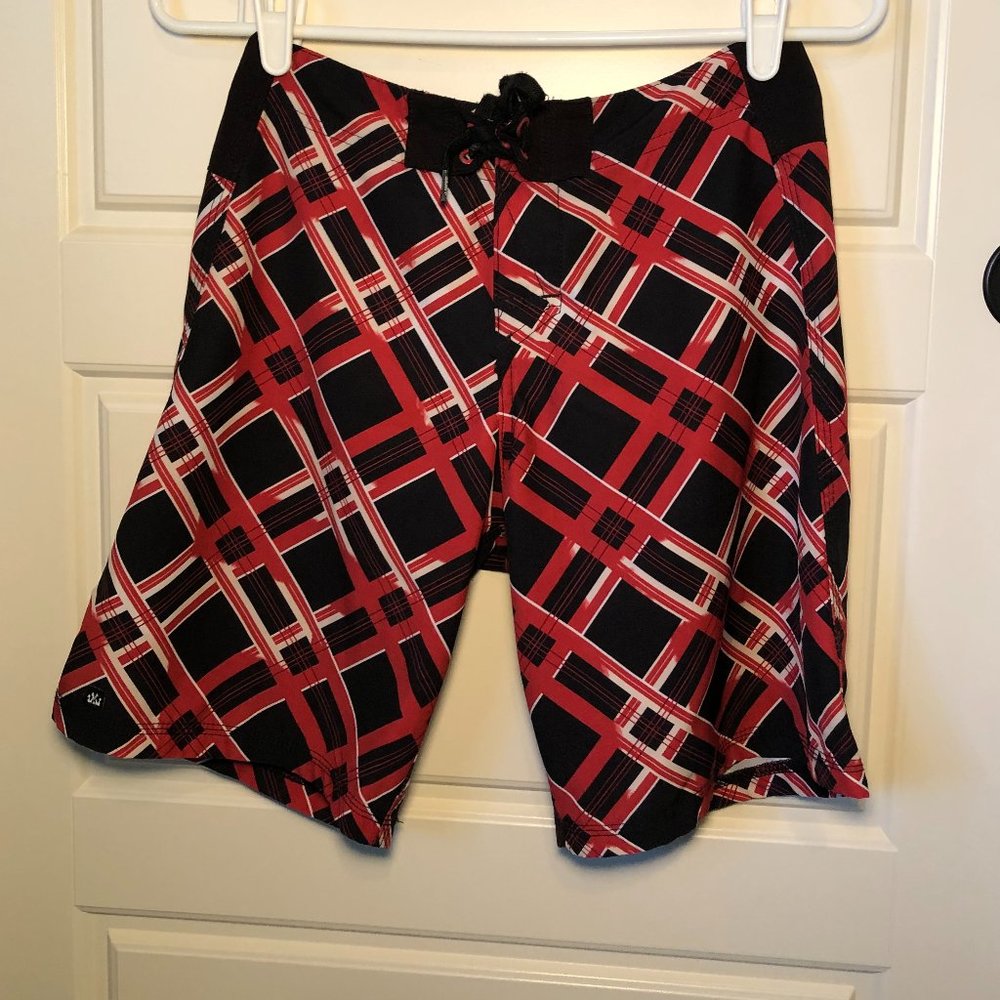 Patterned swim trunks.